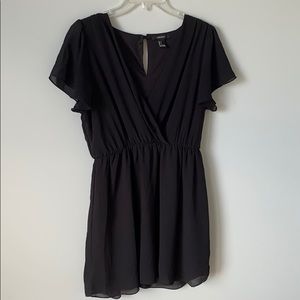 Low cut black mini dress